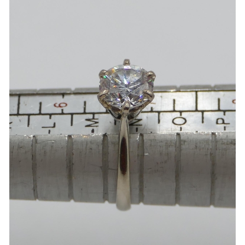 376 - An 18ct white gold moissanite solitaire ring, size N, 2.8 grams gross.