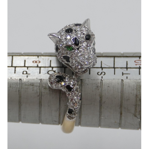 382 - An 18ct gold ring in form of a leopard with allover inset small diamonds and rubies, emerald eyes, s... 