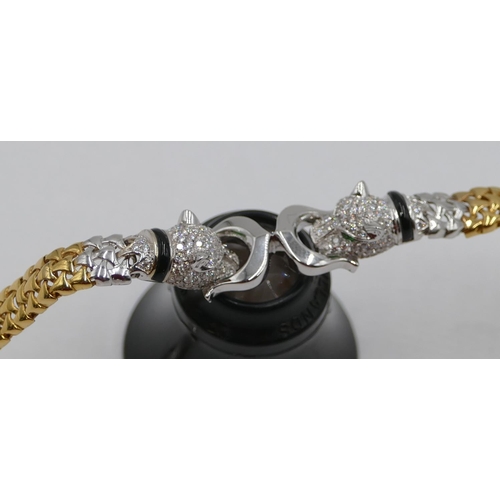 383 - An 18ct white and yellow gold bracelet mounted with 2 leopards heads, inset with allover small diamo... 