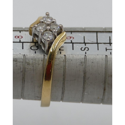 386 - An 18ct gold ladies' twist ring set with 4 diamonds, size Q/R, 5.2 grams gross.