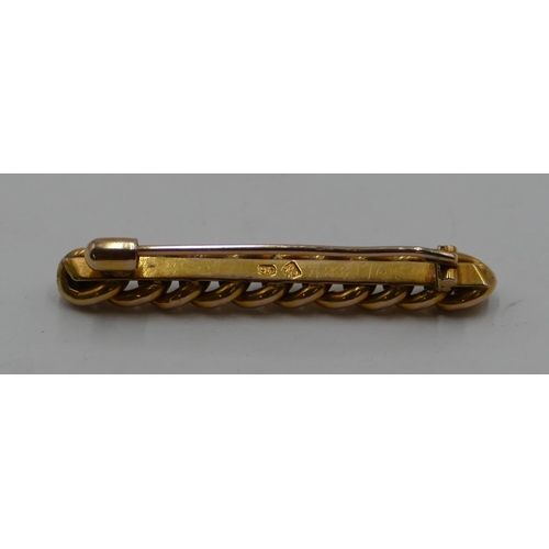 405 - A gold knot bar brooch, 4.4cm long, 2.8 grams.