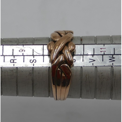 419 - A 9ct gold twist knot shaped ring, size U, 4.1 grams.