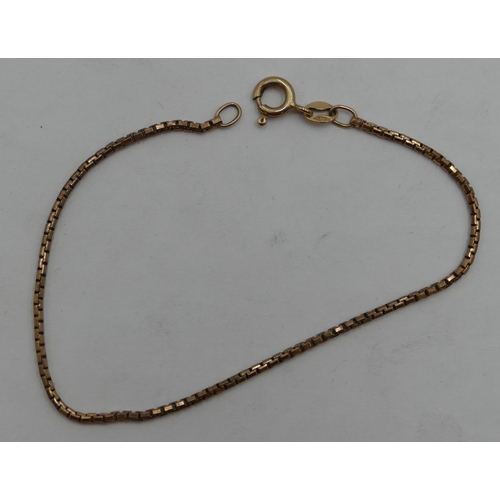 425 - A 9ct gold small square linked bracelet, 18 cm long, 2.2oz.