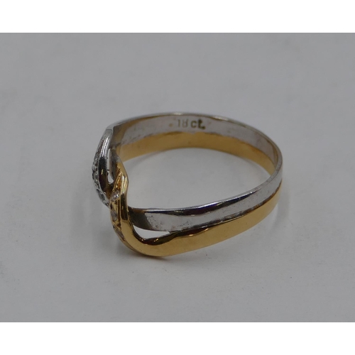 432 - An 18ct 2-coloured gold twist ring set with clear stones, size N/O, 2.8 grams.