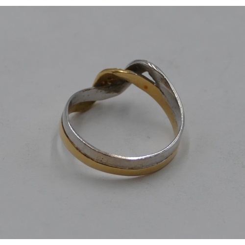 432 - An 18ct 2-coloured gold twist ring set with clear stones, size N/O, 2.8 grams.