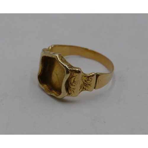 434 - A high ct gold signet ring with shield shaped top (stone missing), size O/P, 4.2 grams.