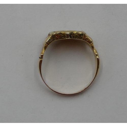 434 - A high ct gold signet ring with shield shaped top (stone missing), size O/P, 4.2 grams.