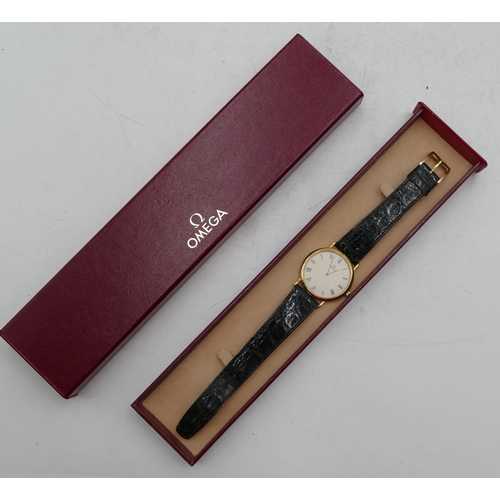 447 - A gentleman's Omega De Ville circular wrist watch with leather strap, with original guarantee and bo... 