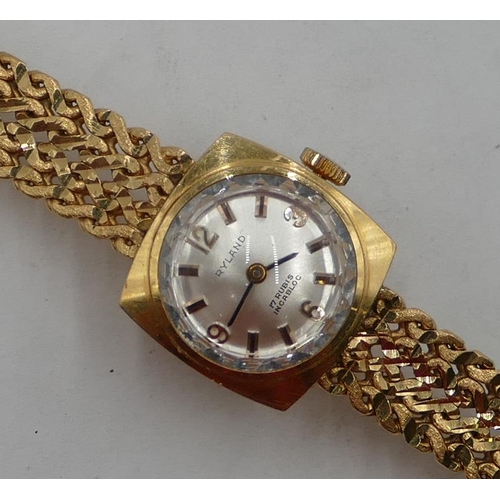 449 - An 18ct gold Continental Ryland ladies' wristwatch with matching strap bracelet, weighable gold 34.3... 