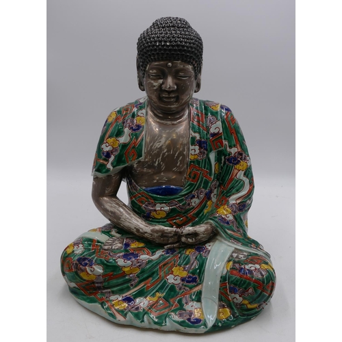 48 - A 19th/early 20th Century Chinese figure of a seated Buddha on silvered ground with multi-coloured c... 