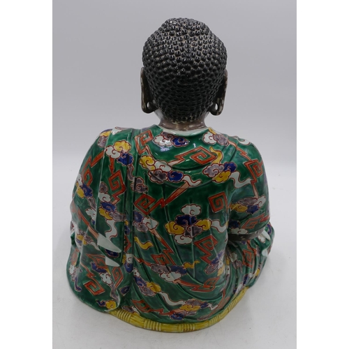 48 - A 19th/early 20th Century Chinese figure of a seated Buddha on silvered ground with multi-coloured c... 