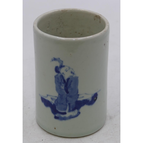 49 - An Oriental blue and white cylindrical brush pot with figure decoration, 14cm high.