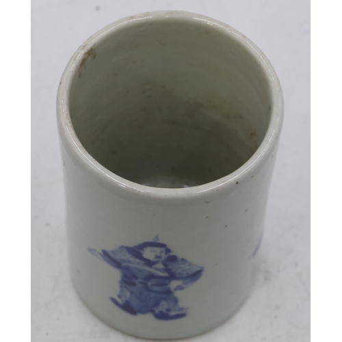 49 - An Oriental blue and white cylindrical brush pot with figure decoration, 14cm high.