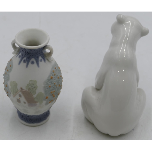 5 - A Lladro figure of a seated polar bear, 7.5cm high, a small Lladro bulbous thin necked,2 -handled va... 