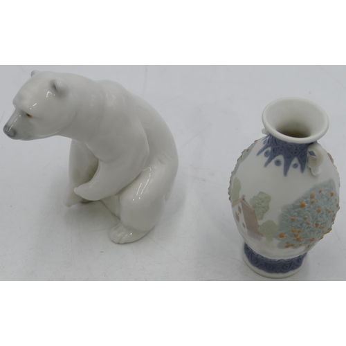 5 - A Lladro figure of a seated polar bear, 7.5cm high, a small Lladro bulbous thin necked,2 -handled va... 