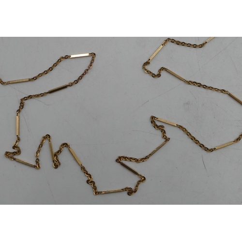 510 - A 9ct gold linked and bar long necklace, 71cm long, 6.1 grams.