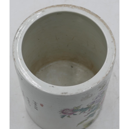 55 - An Oriental cylindrical brush pot on white ground with multi-coloured bird, branch and floral decora... 