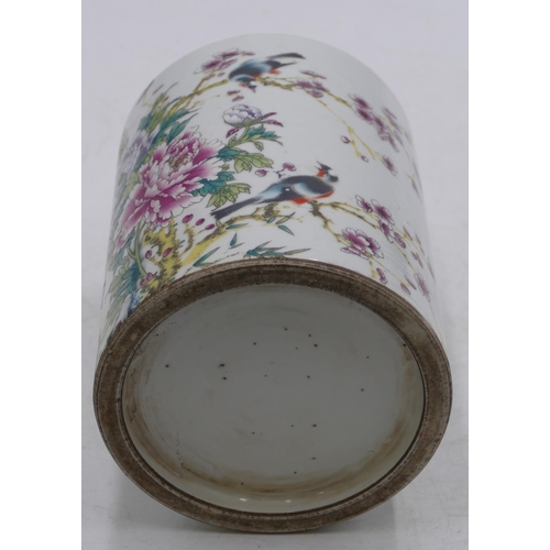 55 - An Oriental cylindrical brush pot on white ground with multi-coloured bird, branch and floral decora... 