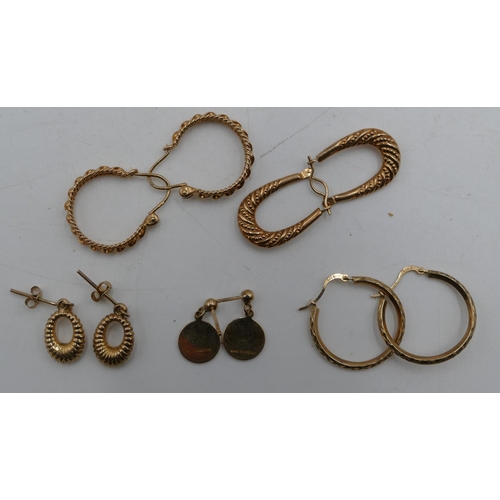 564 - A pair of 9ct gold St Christopher drop earrings and 4 other pairs of 9ct gold earrings, 7.5 grams.