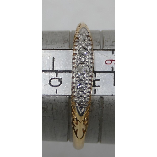 570 - An 18ct gold ladies' boat shaped ring set with 5 small graduated diamonds, size Q/R, 2.6 grams gross... 