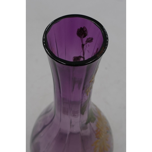 58 - A Mount Joy enamelled round bulbous thin necked glass vase on purple ground with raised coloured ena... 