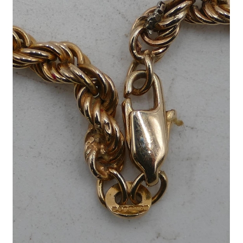 581 - A 9ct gold rope style necklace, 48cm long, 10 grams.