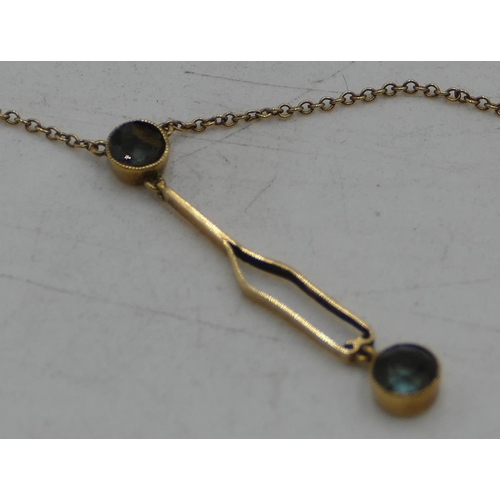 582 - A gold drop pendant mounted with 2 blue stones with fixed gold chain, 2.1 grams gross (a few knots t... 