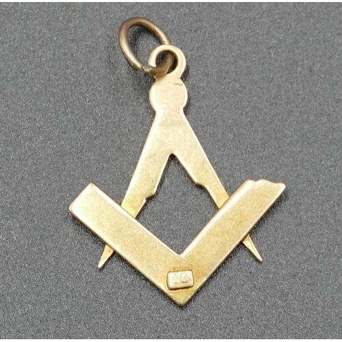 603 - An 18ct gold Masonic pendant, 3.7 grams.