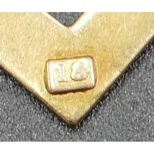 603 - An 18ct gold Masonic pendant, 3.7 grams.