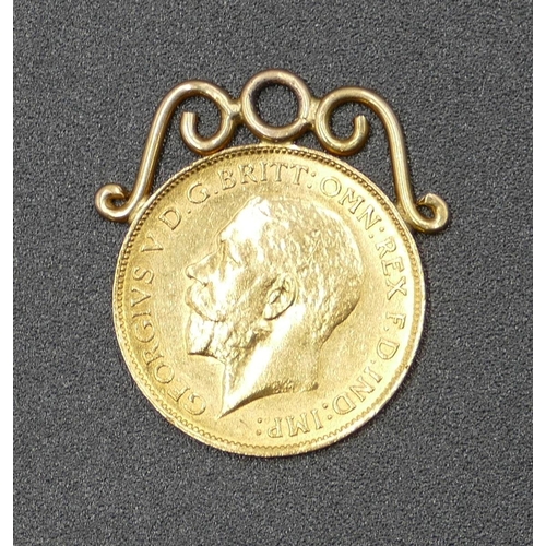 606 - A George V gold half sovereign with welded with pendant top, 1912, 4.5 grams gross.