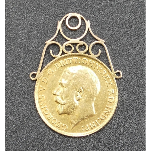 607 - A George V gold half sovereign with welded with pendant top, 1914, 4.6 grams gross.