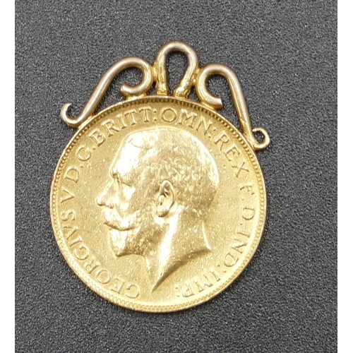 613 - A George V gold sovereign with welded with pendant top, 1926, 8.5 grams gross.