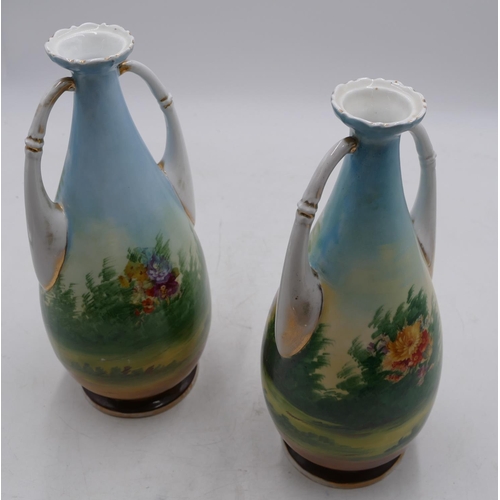 64 - A pair of Continental early 20th Century round bulbous thin necked 2-handled trumpet shaped vases on... 