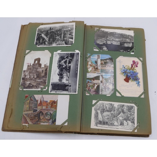 640 - A large postcard album depicting birthday wishes, figures, churches etc