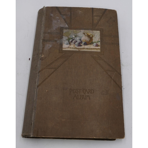 640 - A large postcard album depicting birthday wishes, figures, churches etc