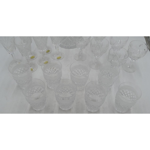 65 - A set of 8 cut glass tumblers with tooth cut decoration, 6 other wine glasses and a cut glass decant... 