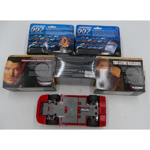 671 - 4 Corgi 007 boxed cars, a set of Casino Royale boxed cars and a Burago model of a Ferrari