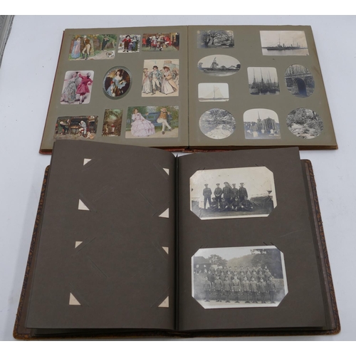 677 - An album of military postcards depicting figures tanks etc and a scrap album depicting figures and l... 