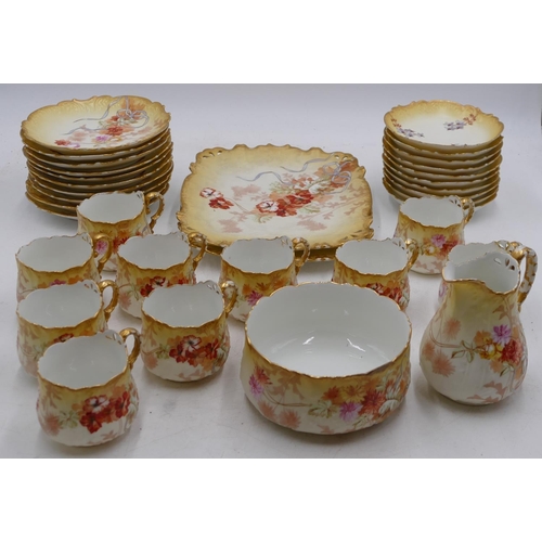 69 - M Redon Limoges service on cream and yellow ground with multi-coloured floral, leaf and gilt decorat... 