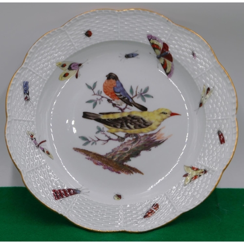 72 - A Meissen round scallop shaped plate on white ground with multi-coloured bird, butterfly and insect ... 