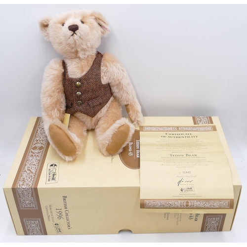 720 - A modern Steiff teddy bear with certificate, 42cm high, boxed.