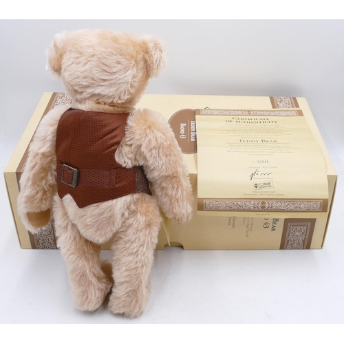 720 - A modern Steiff teddy bear with certificate, 42cm high, boxed.