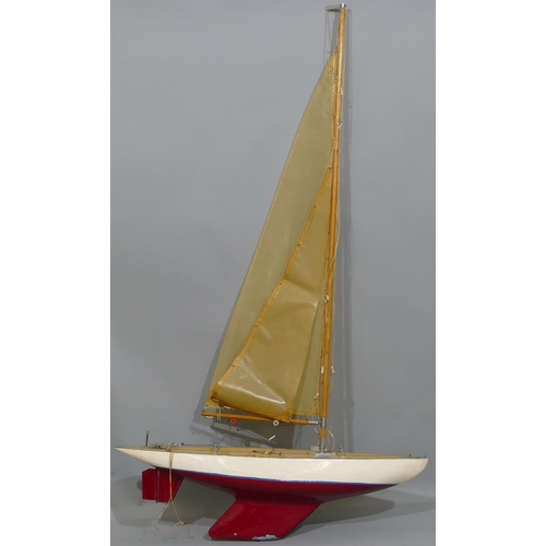 722 - A pond yacht with sails 75cm long, 1 meter 30cm high overall.