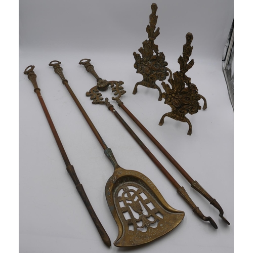 727 - 3 brass fire irons and a pair of brass fire dogs. (5)