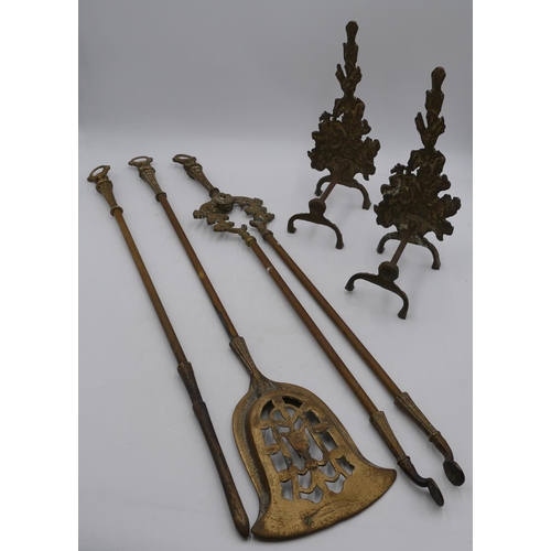 727 - 3 brass fire irons and a pair of brass fire dogs. (5)