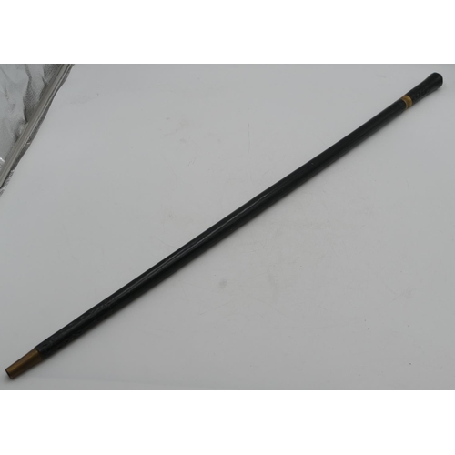 728 - An ebonised sword stick with gilt metal mounts, 91cm long overall.