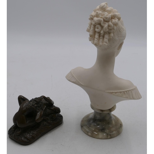 731 - A composition bust of a lady on round onyx base, 26cm high and a composition erotic group, 12.5cm wi... 