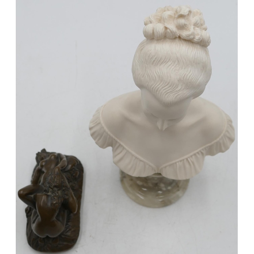 731 - A composition bust of a lady on round onyx base, 26cm high and a composition erotic group, 12.5cm wi... 