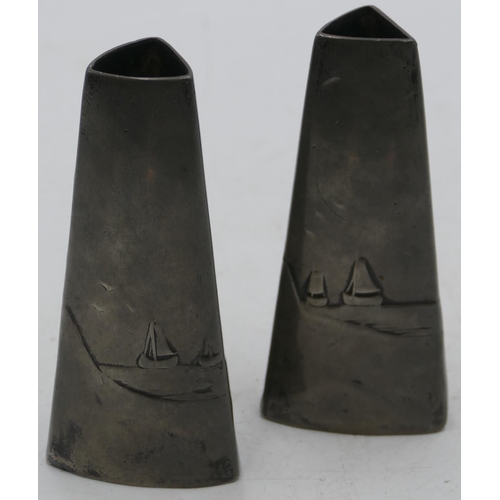 734 - A pair of WMF triangular shaped spill vases with embossed Dutch children and windmill motif, both st... 