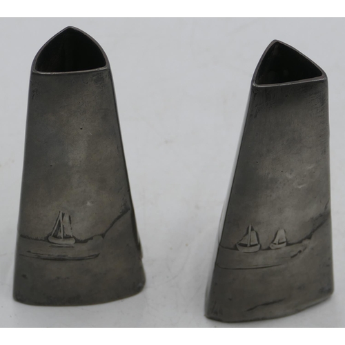 734 - A pair of WMF triangular shaped spill vases with embossed Dutch children and windmill motif, both st... 